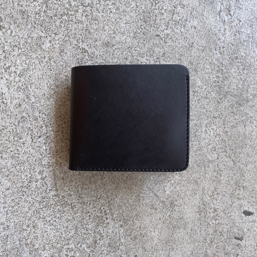 https://www.stuf-f.com/media/image/13/b3/c3/kobashi-studio-fold-wallet-black-1.jpg