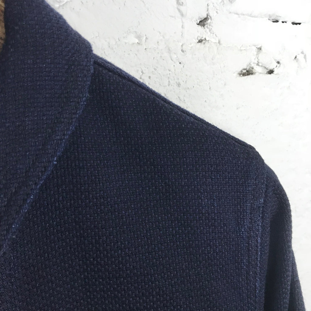 https://www.stuf-f.com/media/image/9f/02/e8/momotaro-jeans-indigo-dobby-shawl-collar-jacket-35af9a4a2bb552.jpg