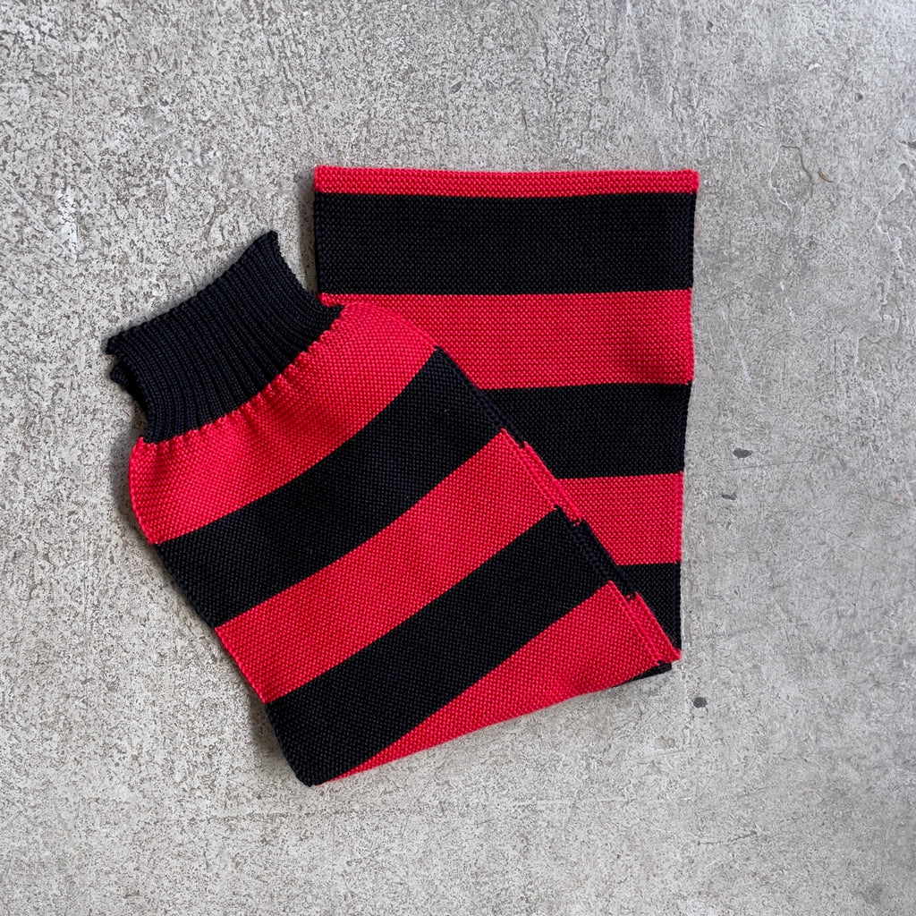 https://www.stuf-f.com/media/image/d4/35/5e/the-real-mccoys-buco-striped-wool-knit-scarf-red-black-1.jpg