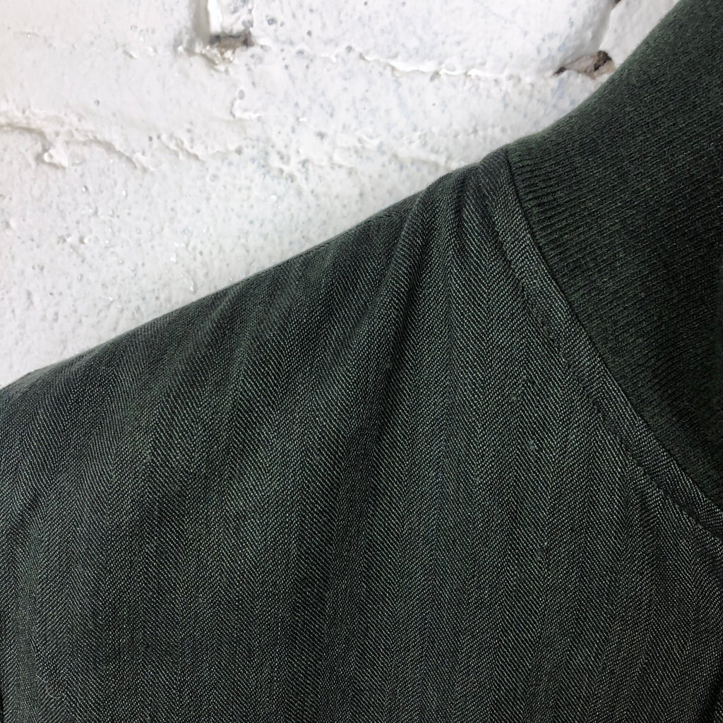 https://www.stuf-f.com/media/image/30/e3/7b/valstar-valstarino-slim-fit-lined-linen-blend-herringbone-fabric-army-green-1.jpg