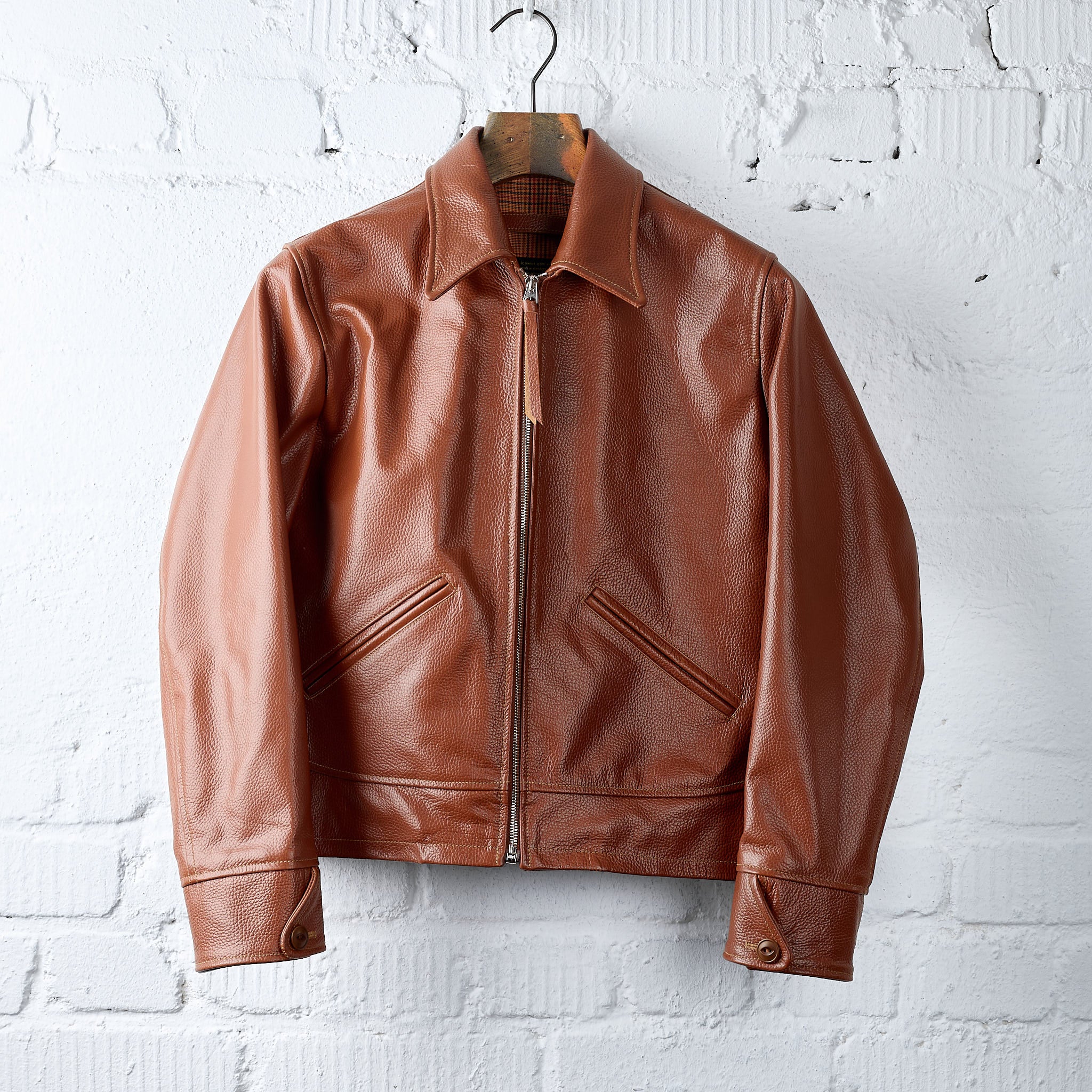 dejavu-iconic-brown-cowhide-