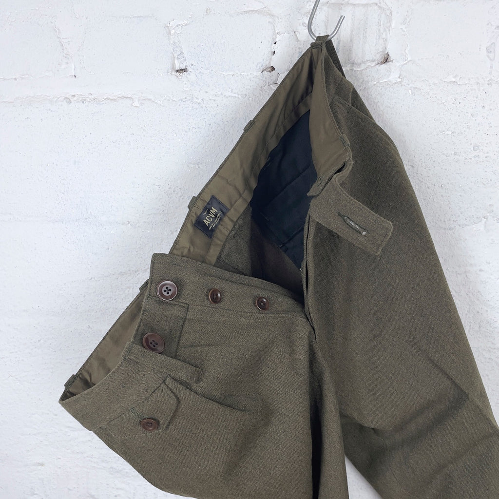 https://www.stuf-f.com/media/image/a3/6d/10/addict-clothes-acv-tr02cw-single-pleated-cotton-wool-trousers-olive-1.jpg