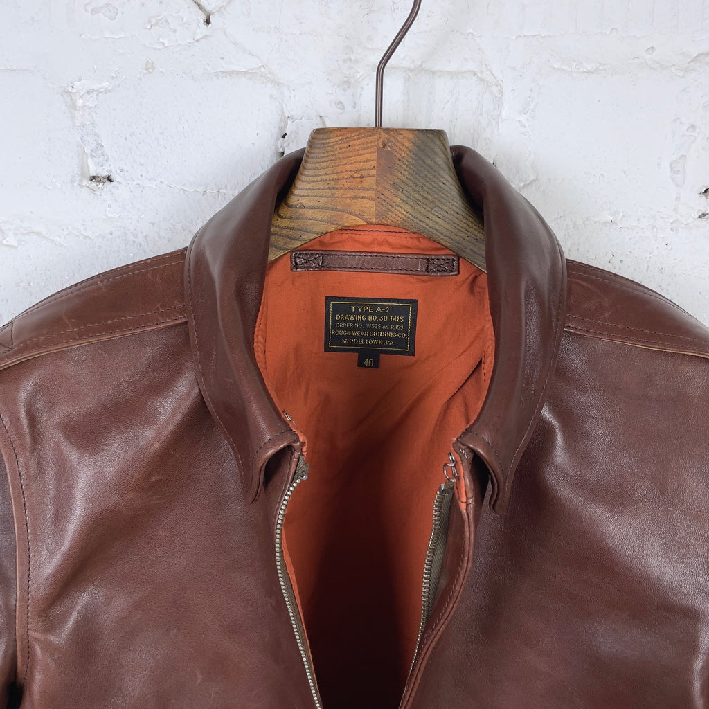 https://www.stuf-f.com/media/image/a9/d4/61/double-helix-a2-flight-jacket-oiled-wax-leather-brown-1.jpg