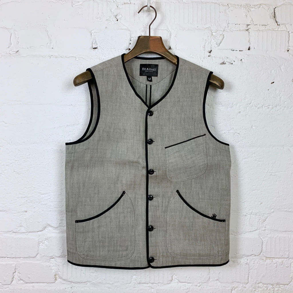 https://www.stuf-f.com/media/image/54/c2/6b/fit-and-craft-raw-selvedge-denim-vest-grey-2.jpg
