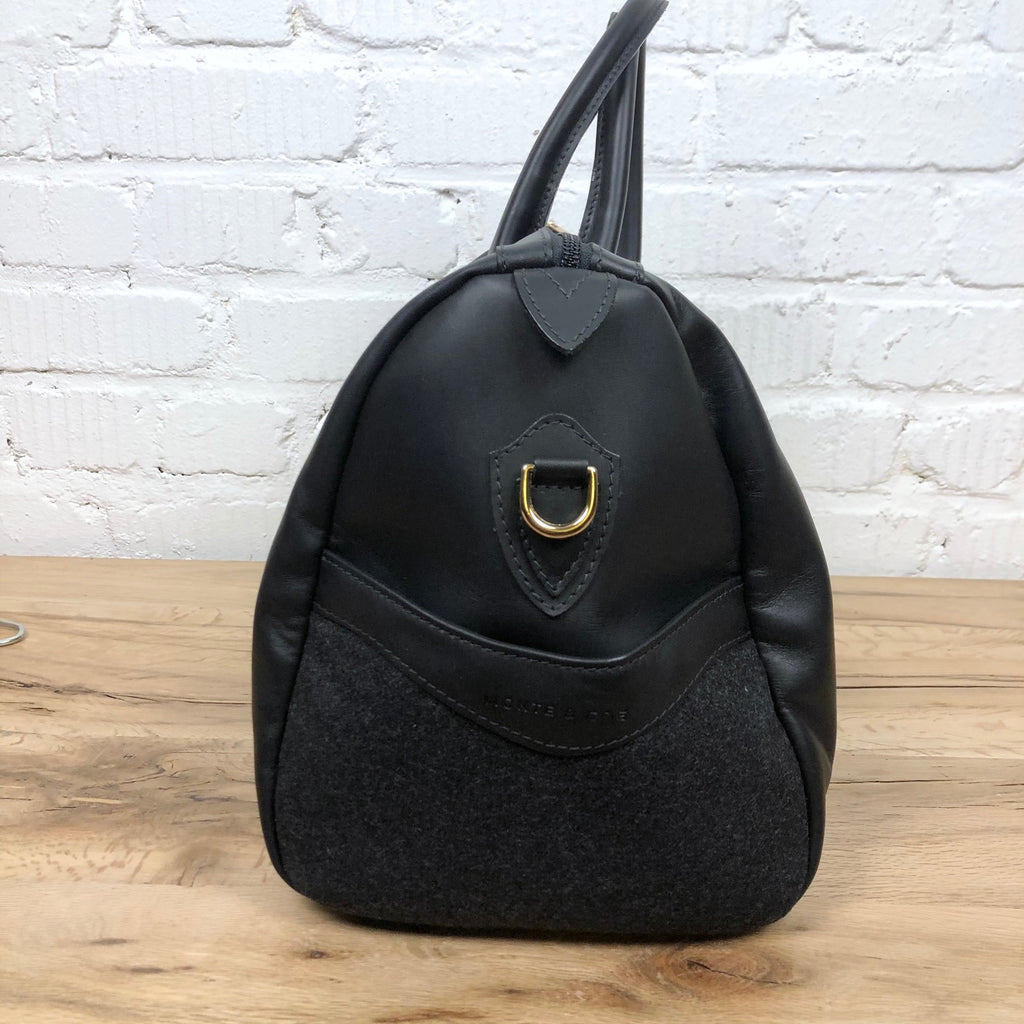 https://www.stuf-f.com/media/image/02/25/d3/monte-and-coe-leather-weekender-bag-black-3.jpg