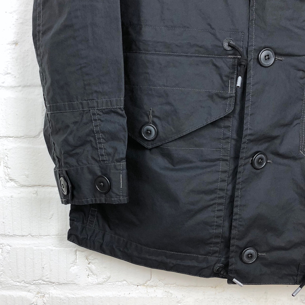 https://www.stuf-f.com/media/image/7c/3e/68/rrl-waxed-cotton-hooded-jacket-dark-navy-4.jpg