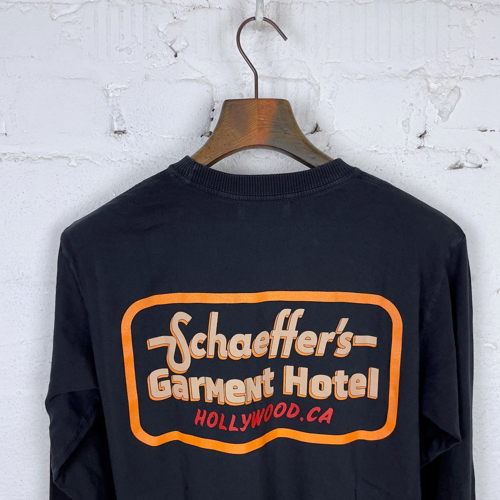 https://www.stuf-f.com/media/image/36/8b/6c/schaeffers-garment-hotel-script-logo-long-sleeve-black-4.jpg