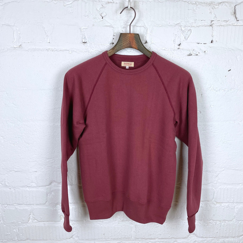 https://www.stuf-f.com/media/image/77/3e/f6/the-real-mccoys-9oz-loopwheel-raglan-sleeve-sweatshirt-maroon-1.jpg