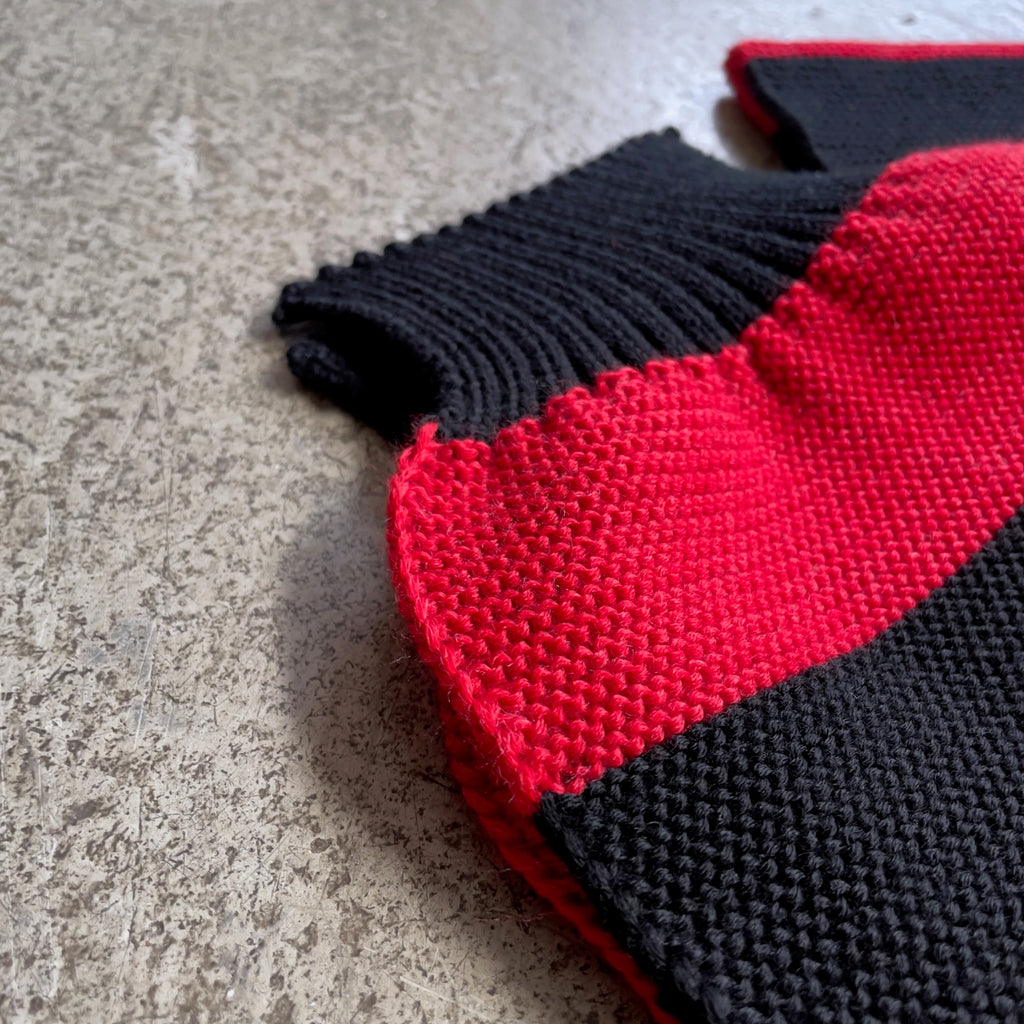https://www.stuf-f.com/media/image/21/ea/1c/the-real-mccoys-buco-striped-wool-knit-scarf-red-black-2.jpg