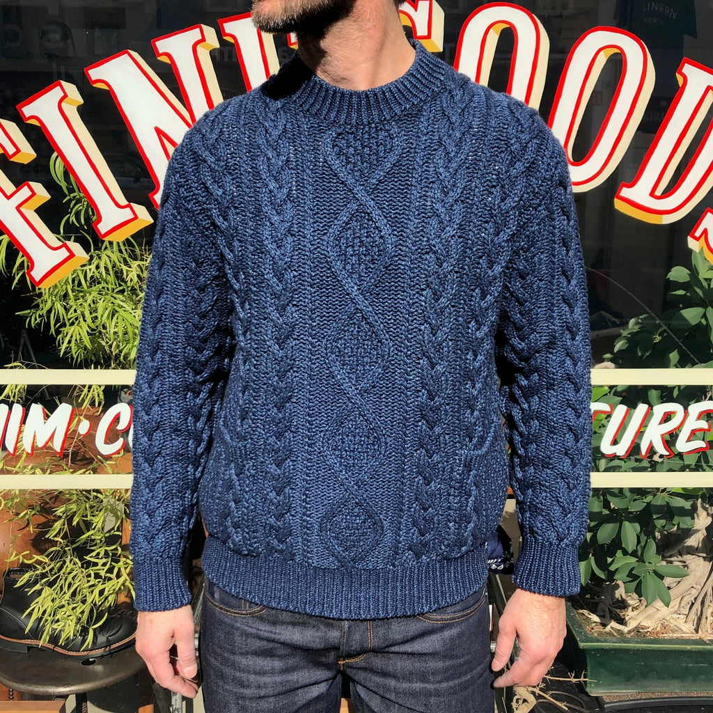 https://www.stuf-f.com/media/image/7e/78/cf/the-real-mccoys-indigo-aran-crewneck-sweater-4.jpg