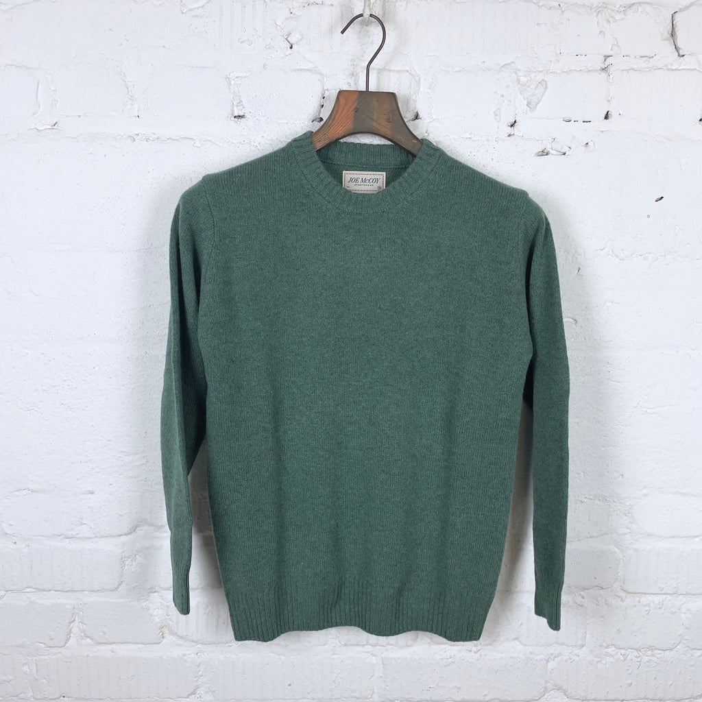 https://www.stuf-f.com/media/image/6d/c9/43/the-real-mccoys-mc21114-wool-crewneck-sweater-k-green-1.jpg