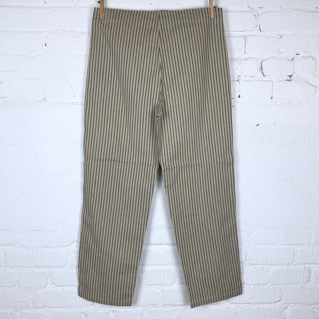https://www.stuf-f.com/media/image/0d/d6/bc/the-real-mccoys-ticking-stripe-pajama-trousers-2.jpg