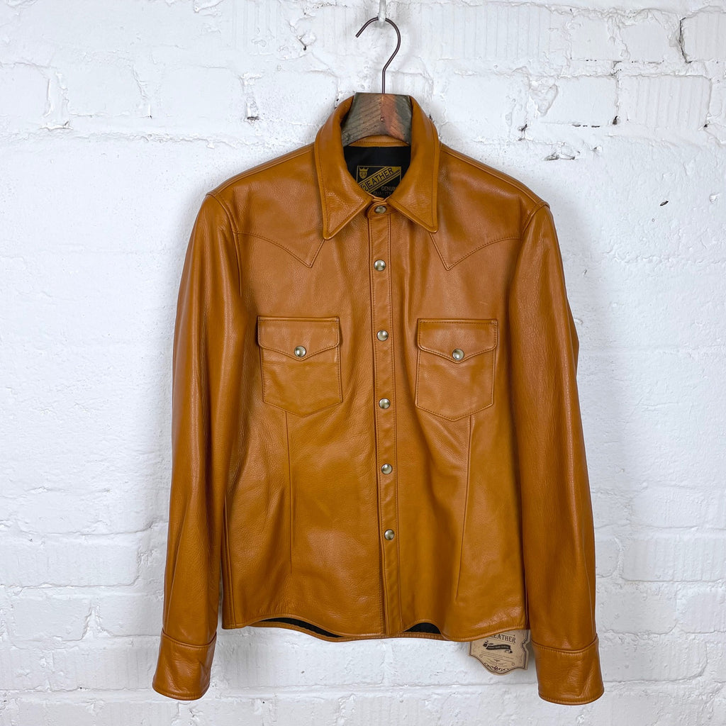 http://shopware.p274321.webspaceconfig.de/media/image/8c/af/4b/y-2-leather-steer-oil-western-shirt-camel-ss-13-1.jpg