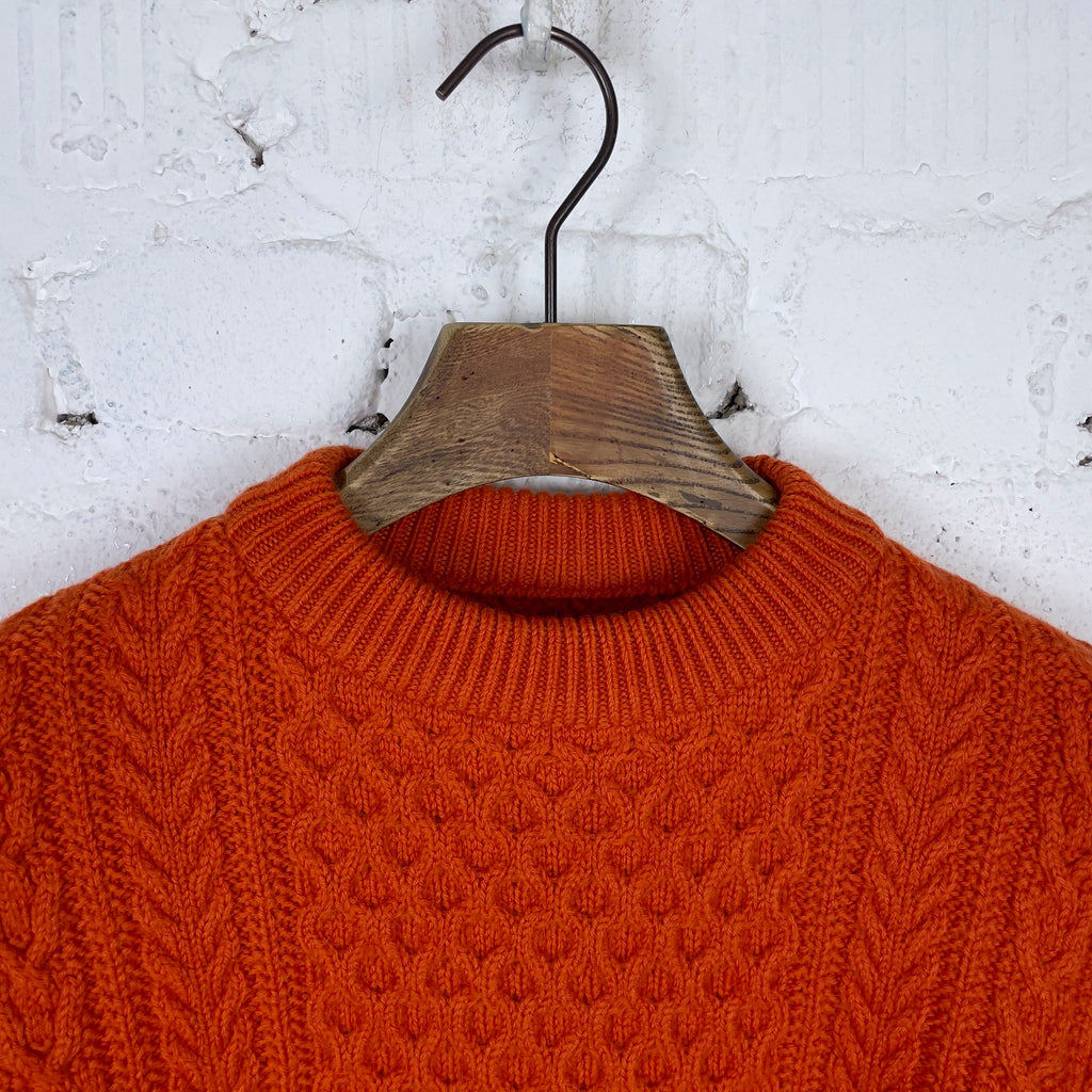 https://www.stuf-f.com/media/image/65/0d/26/yonetomi-reborn-wool-aran-sweater-orange-1.jpg